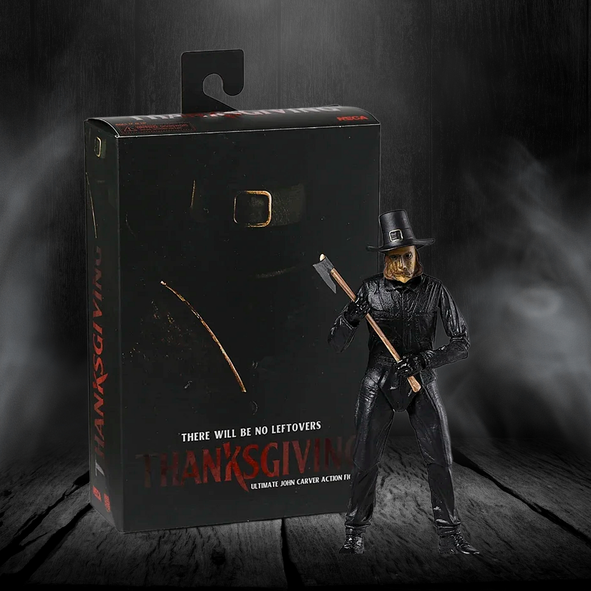 Action figure of a character from 'Thanksgiving' movie with packaging on a dark background