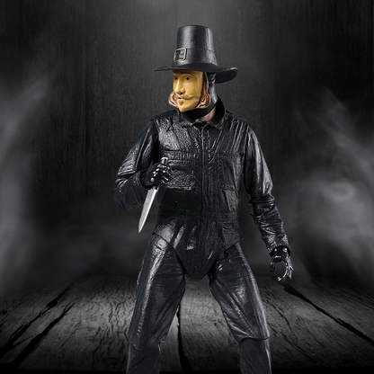 Figure in black leather outfit with hat and knife on a dark background