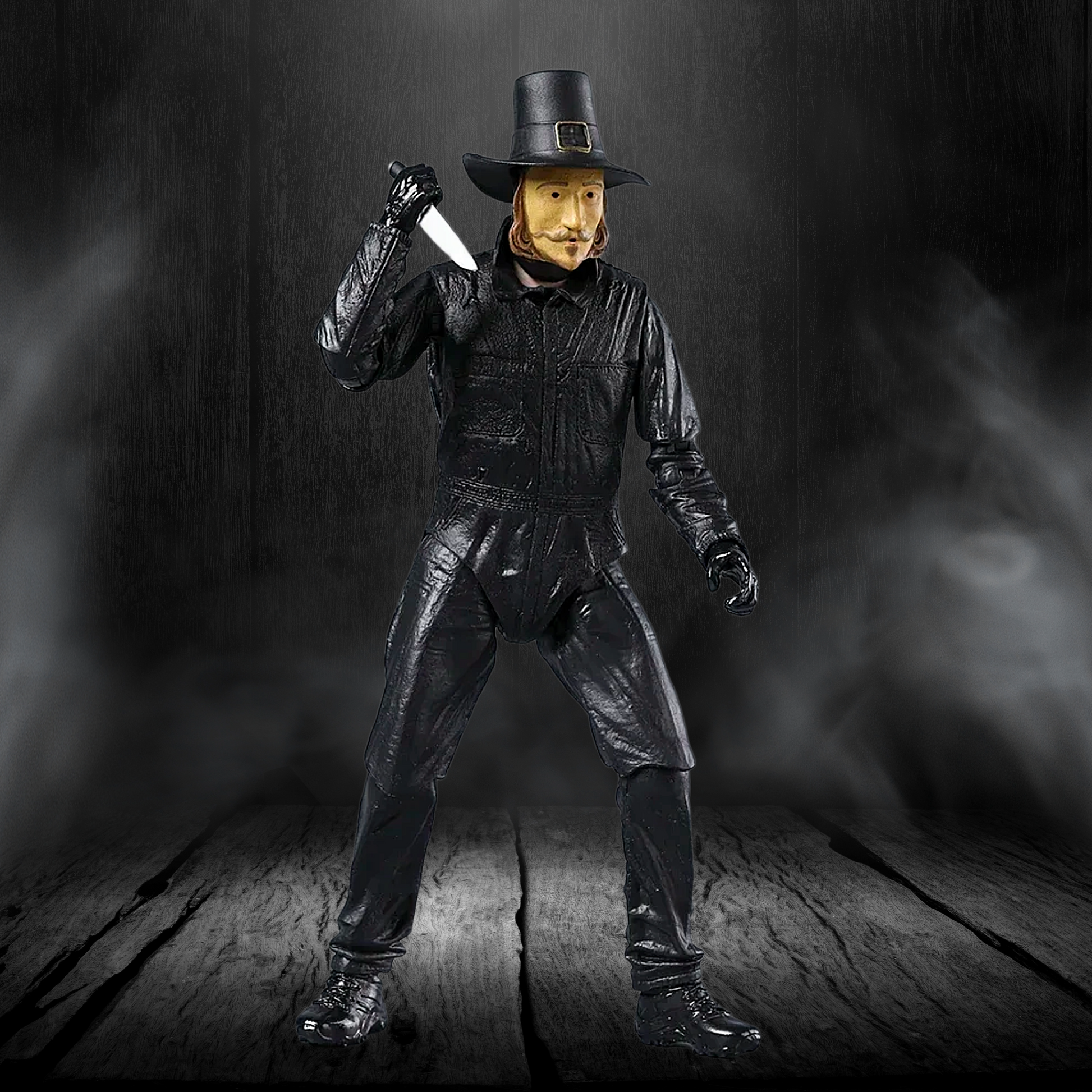 Figure in black leather outfit with a hat and knife on a dark background