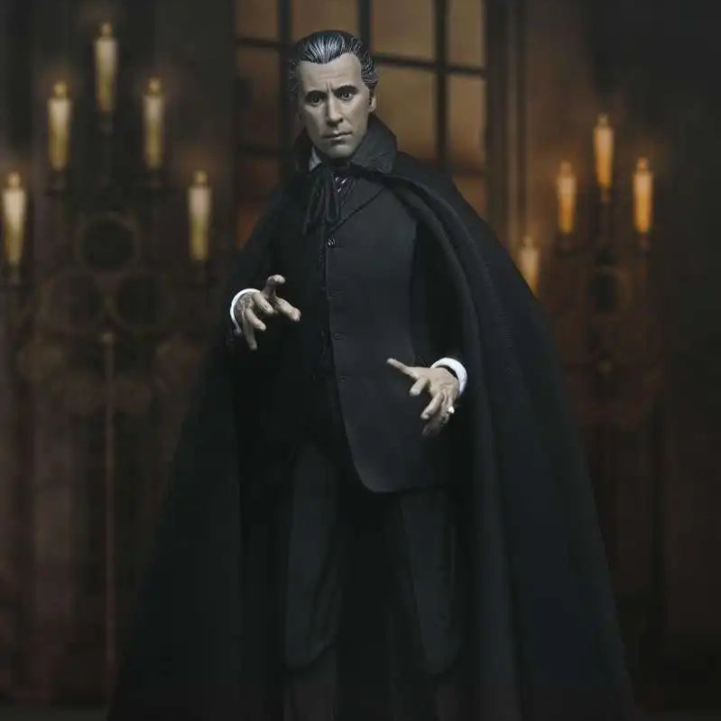 Action figure of a character in a dark cape and suit with gothic architecture in the background