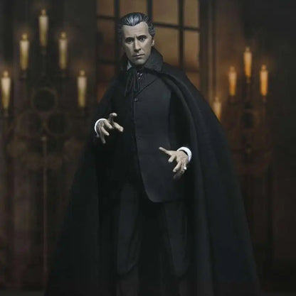 Action figure of a character in a dark cape and suit with gothic architecture in the background