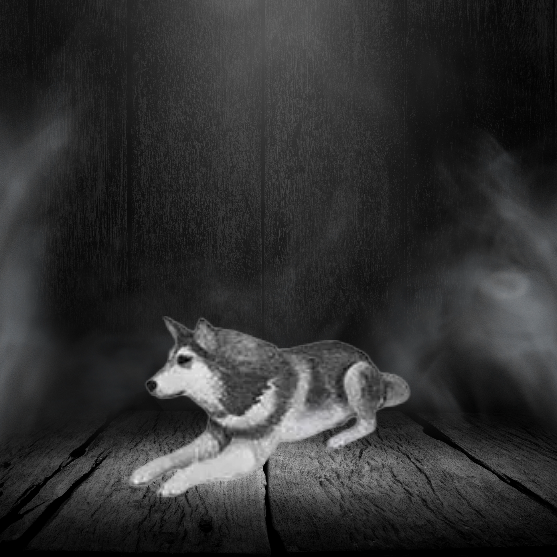 Black and white dog figurine on a wooden surface with a dark background