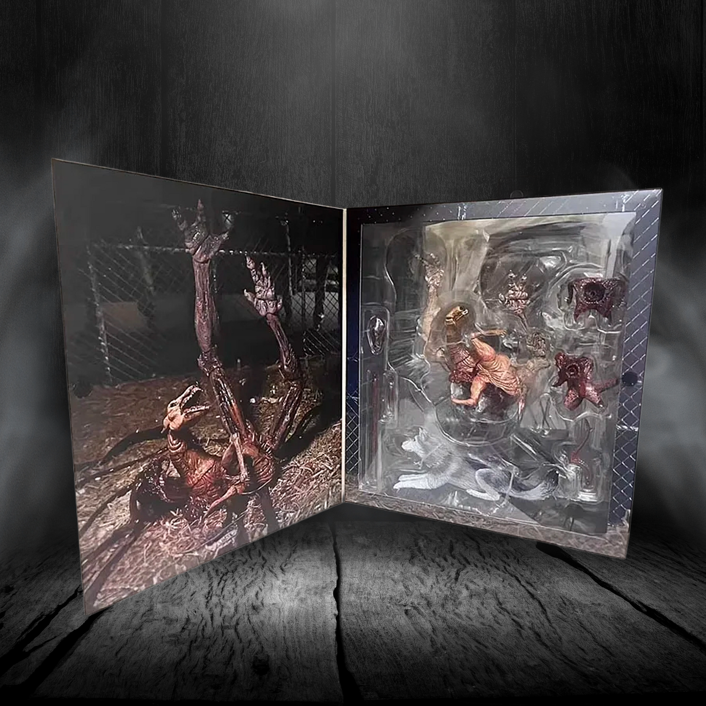 Open box containing action figures with a dark, textured background